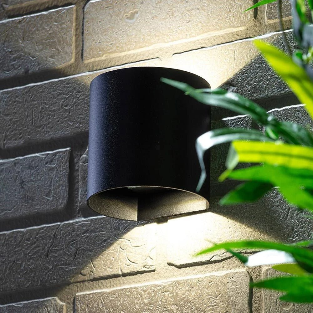 MAUI | Outdoor Curved Cylinder Up Down Wall Light Fitting | 8W LED | 4000K Neutral White | IP54 | Black - LightHub Direct