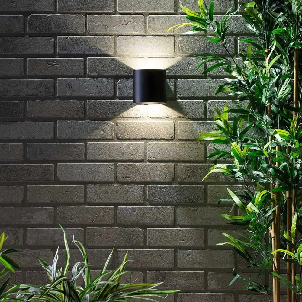 MAUI | Outdoor Curved Cylinder Up Down Wall Light Fitting | 8W LED | 4000K Neutral White | IP54 | Black - LightHub Direct