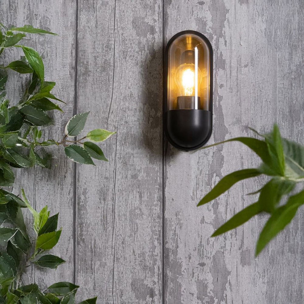 PILULE | LED Oval Bulkhead Outdoor Glass Wall Light Lantern | 6W E27 | 3000K Warm White | IP44 | Black - LightHub Direct