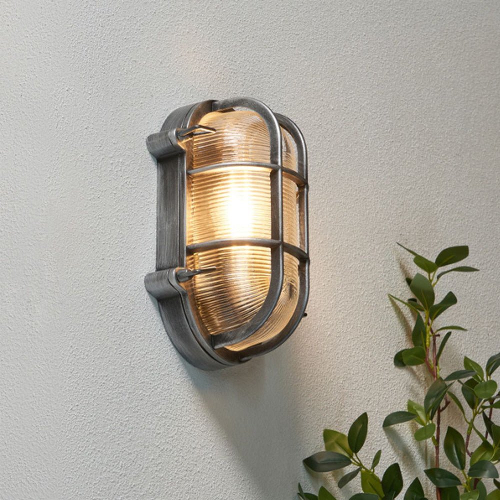 DAVEY | Outdoor Caged Oval Industrial Marine Nautical Wall Porch Bulkhead Light | E27 | IP44 | Silver - LightHub Direct