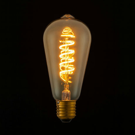 Vintage-style light bulb with visible filament on a black background