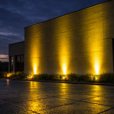 Modern building exterior with illuminated walls at night