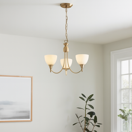 Living room with a chandelier, sofa, and decorative elements.