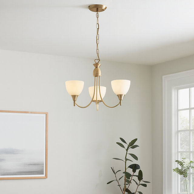 Living room with a chandelier, sofa, and decorative elements.