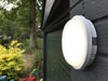 SOHO 15W LED IP65 Bulkhead light on outside garage wall in garden illuminated